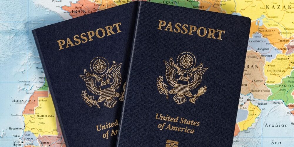American,Passports,Over,World,Map,Atlas,Stock,Photo,Concept,Of Mobile Passport Control