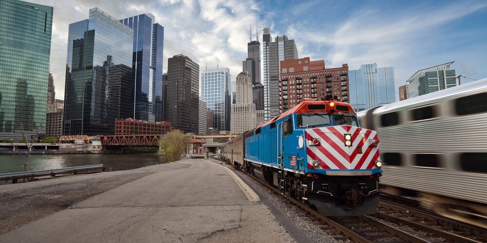 Chicago,Metra,Train.,Metra,Train,Arriving,From,Chicago,Downtown,District. Chicago Metra to O'Hare