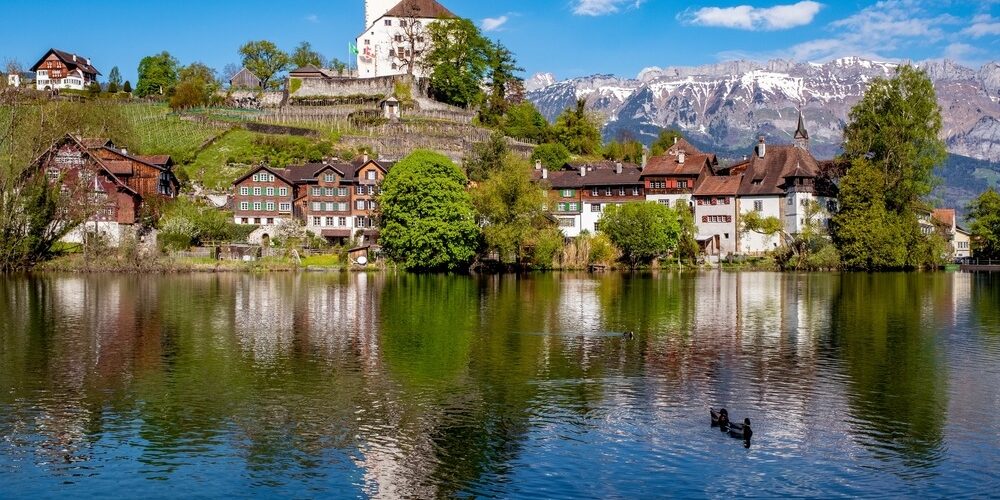 Pretty,Town,Of,Werdenberg,In,Liechtenstein,Surrounded,By,High,Mountains Liechtenstein River Cruise on the Rhine