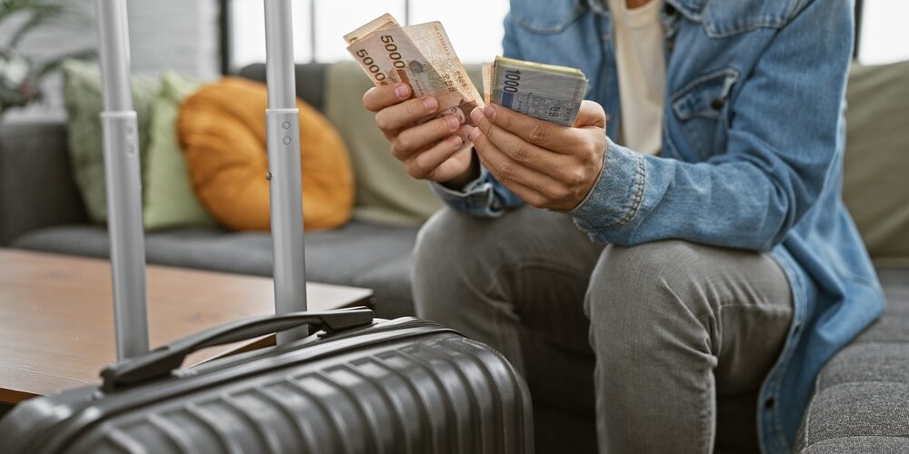 A,Man,In,A,Denim,Jacket,Counts,Korean,Won,Before