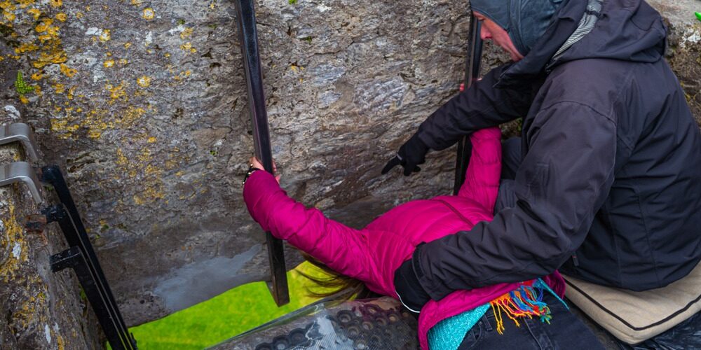 Blarney,,Ireland,Circa,May,2019.,Woman,Trying,To,Kissing,The