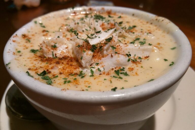 Bowl of She Crab Soup with crab meat garnish